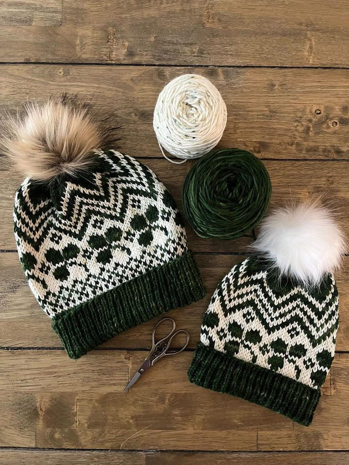 green and white hand knit hat with shamrocks
